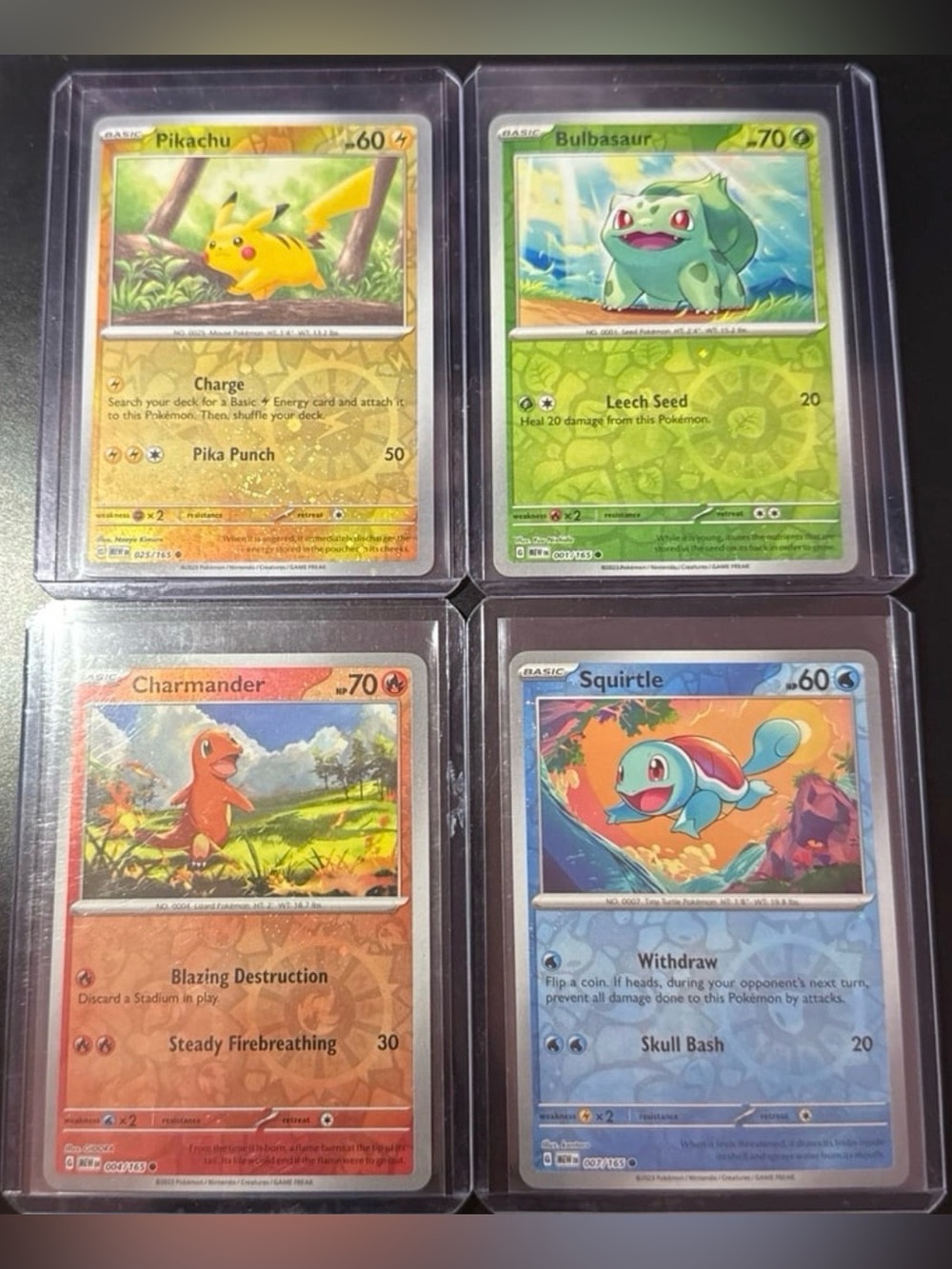 Set of 4 Reverse Cosmos Holo Costco Exclusive released Pikachu with swirls Nm
